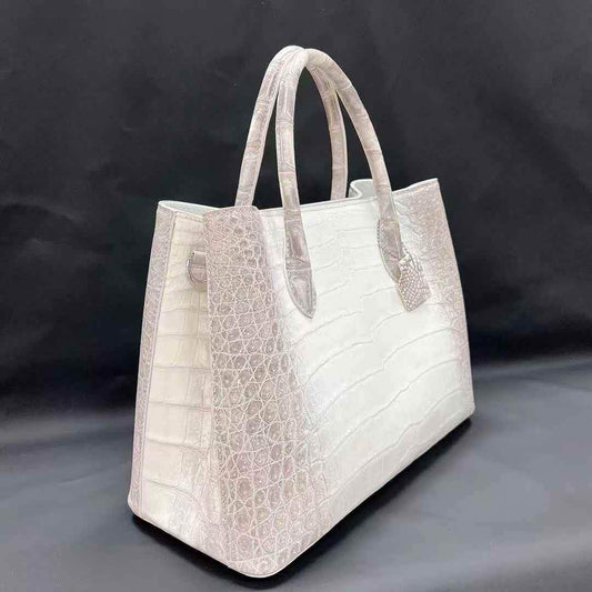 white Himalaya crocodile belly leather tote bag with structured silhouette and dual rolled handles