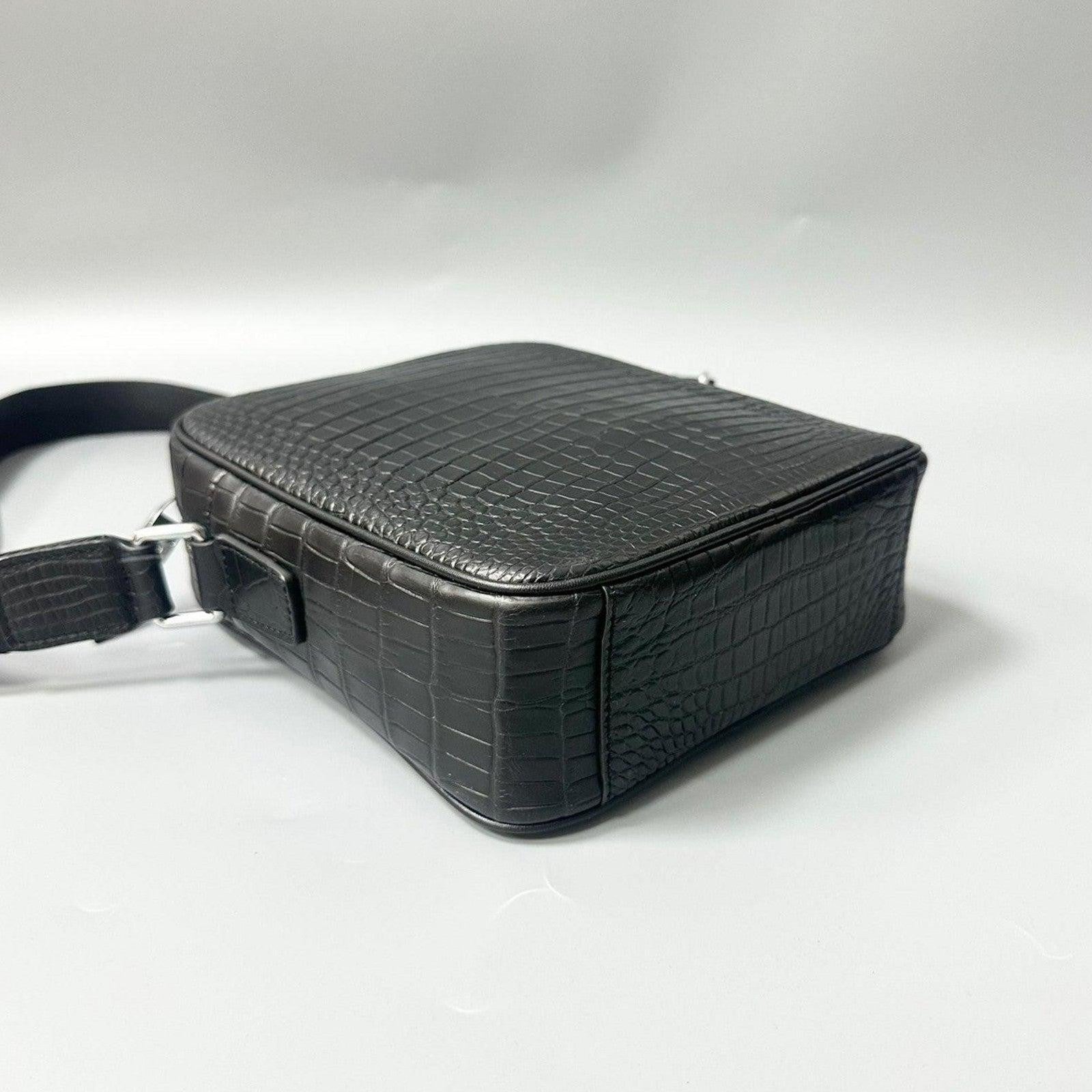 bottom view of genuine alligator leather crossbody bag showing scale pattern