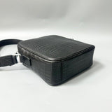 bottom view of genuine alligator leather crossbody bag showing scale pattern