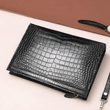 black genuine alligator belly leather men's clutch flat lay view