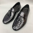 Premium black handmade alligator tassel loafers for men featuring exotic leather texture and timeless slip-on style